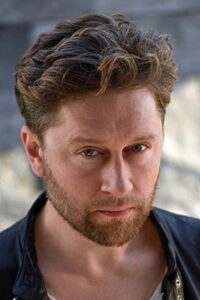 Адриан Тополь